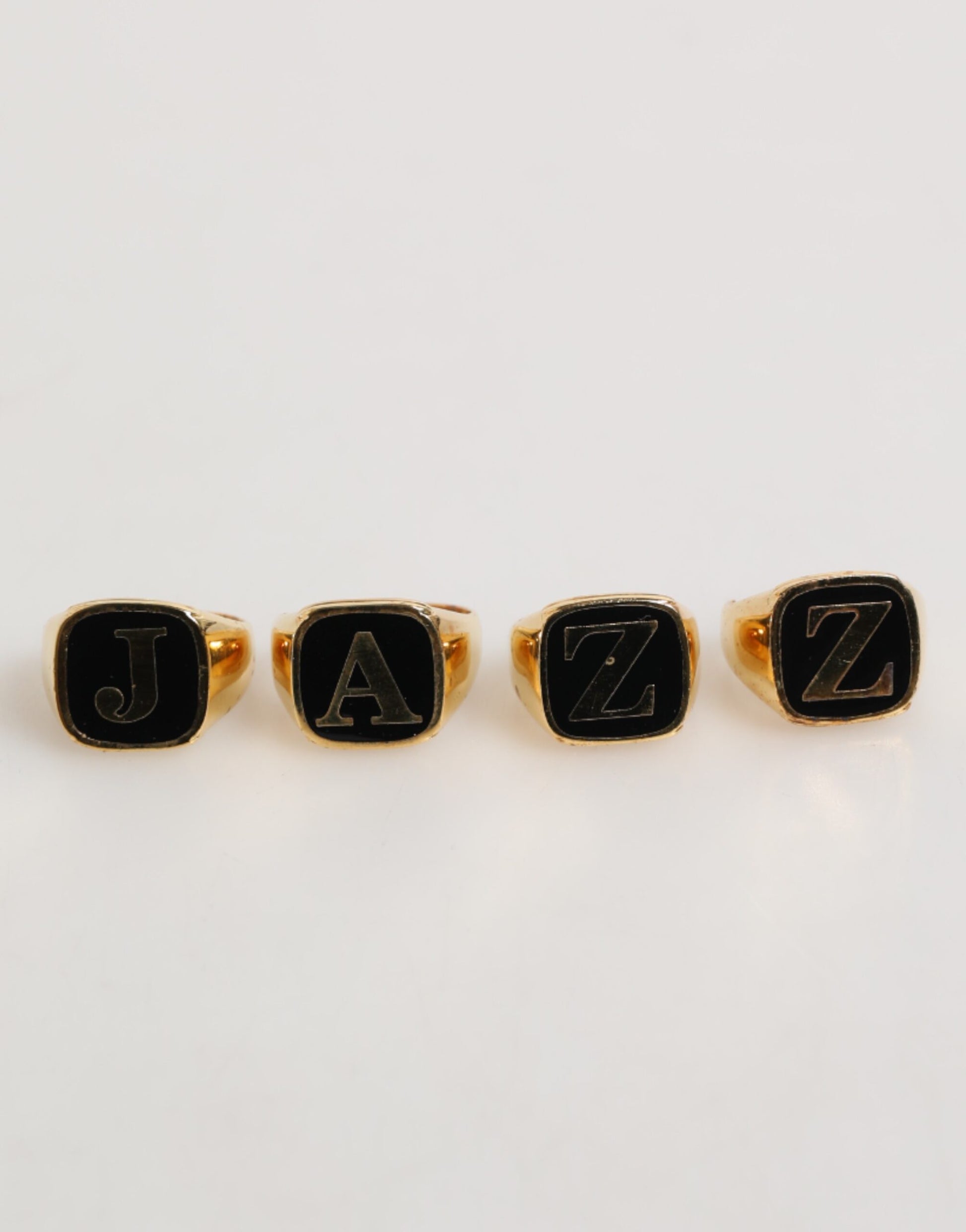 Dolce & Gabbana Gold Tone Brass JAZZ Letter Set 4 Pieces Adjustable Ring - ClickThatClicks 